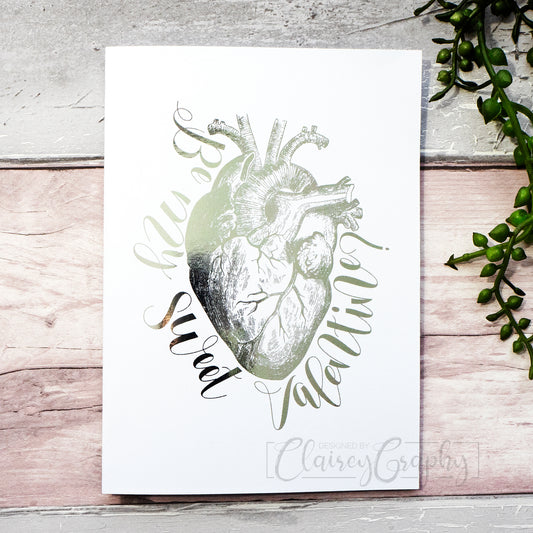 Be My Sweet Valentine - Anatomical Heart - silver. 7x5 inch handmade foil card by ClaireyGraphy, printed by Bright Bear Designs