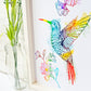 Hummingbird - Rainbow foil, side view, framed. Handmade foil print created by Stargazer Lily, produced by Bright Bear Designs