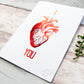 I Heart You Anatomical Heart - red foil, side view. 7x5 inch handmade foil card by ClaireyGraphy, printed by Bright Bear Designs