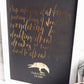 The Raven - gold on black, side view. Handmade foil print by Bright Bear Designs