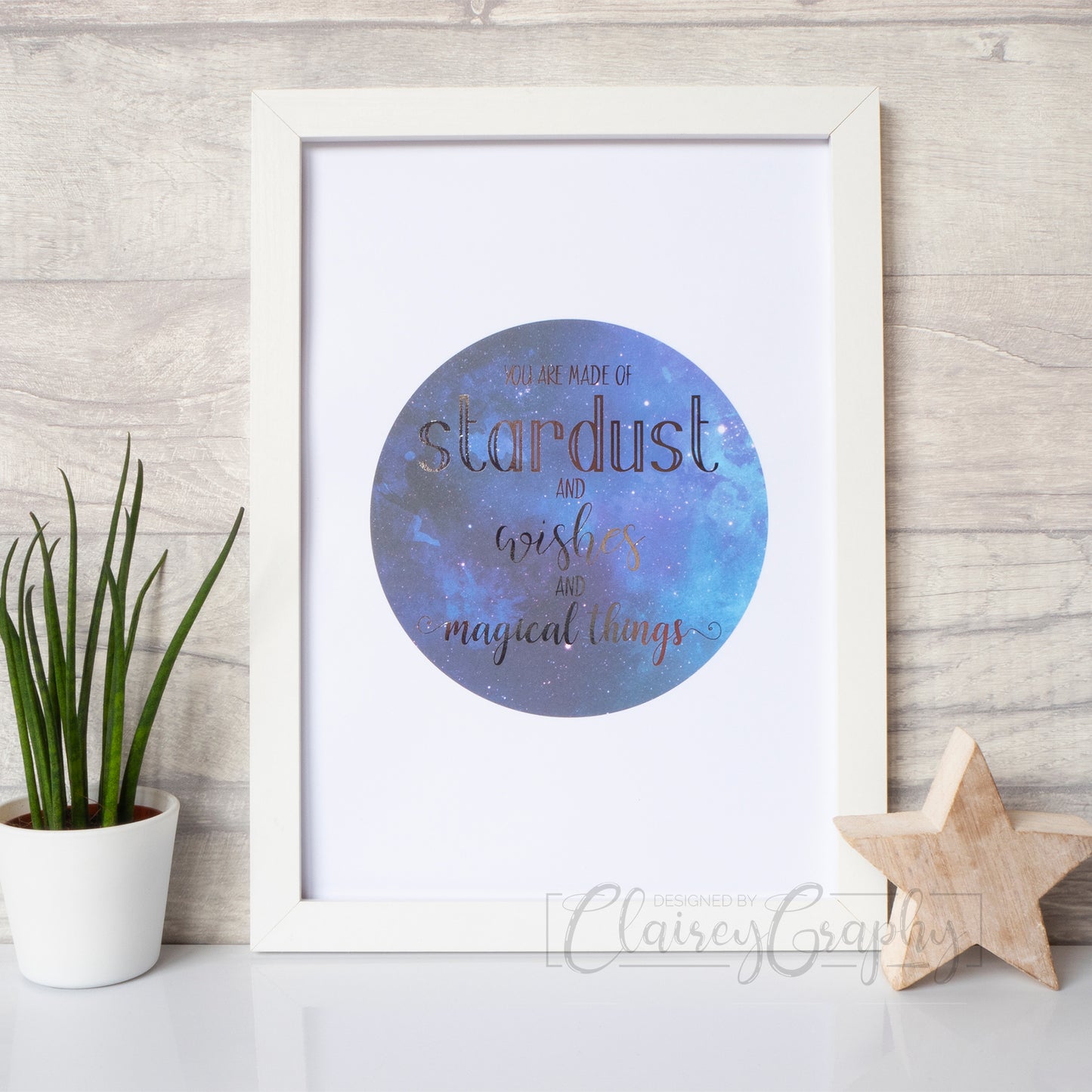 You Are Made of Stardust - silver on watercolour. Handmade foil print by ClaireyGraphy, printed by Bright Bear Designs